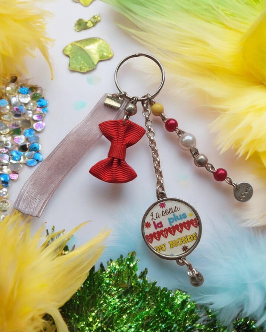 🔑 Porte-clés “La sœur la plus gentille du monde” – Cadeau tendre et coloré pour une sœur adorée